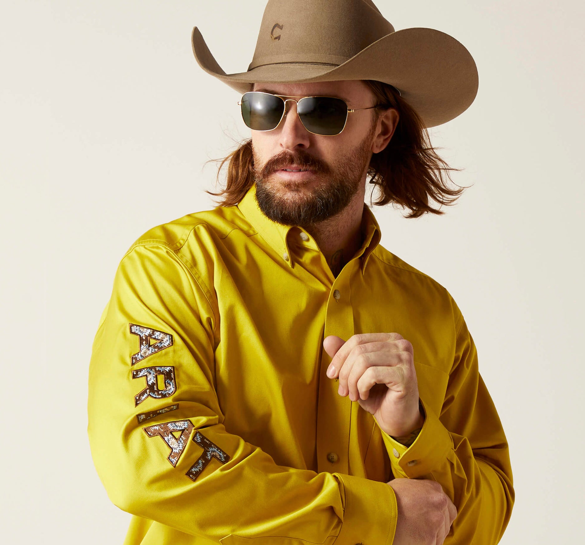 (ARIAT) LOGOTIPO DEL EQUIPO SARGA CLÁSICA